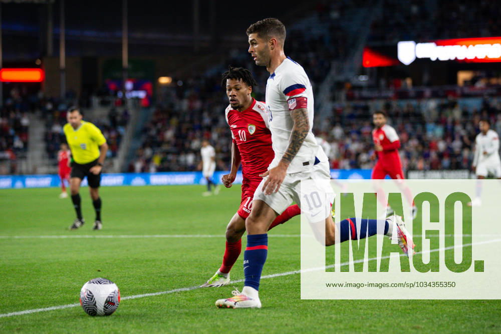SAINT PAUL, MN - SEPTEMBER 12: United States of America forward Christian Pulisic (10) runs with the ball while being defended by by Oman defender Jameel Alyahmadi (10) during the friendly match between U.S. Mens national team, Nationalteam and Oman on September 12th, 2023, in Saint Paul, MN. (Photo by Bailey Hillesheim Icon Sportswire) SOCCER: SEP 12 USA vs Oman Icon230919007