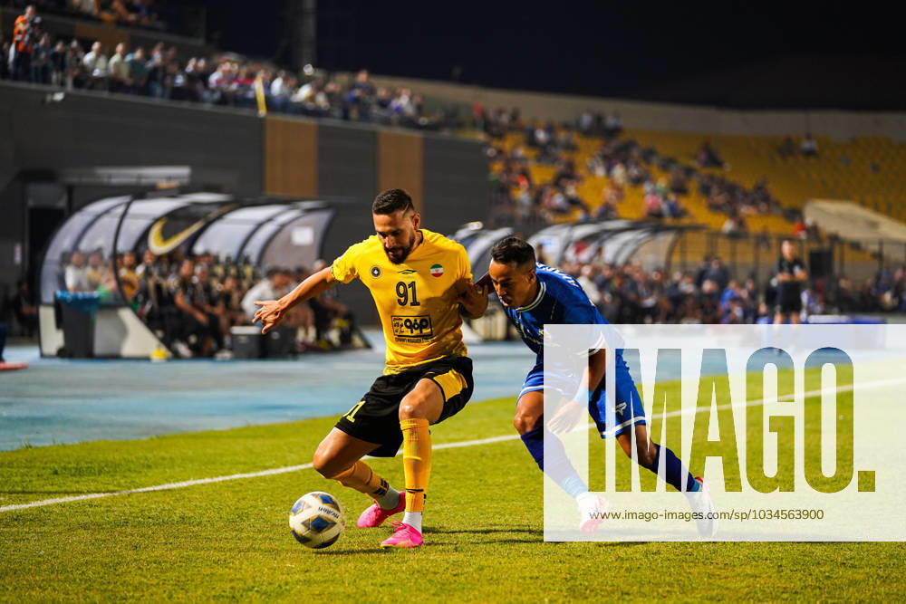 Iraq s Al-Quwa Al-Jawiya (Air Force)?? Iran s Sepahan - AFC Champions League in Erbil, Iraq - 18 Sep 2023 Sepahan s player 91Nilson Barbosa (L) and Jawiya s player 77 Ahmed Al-sarori (R) compete for the ball during the first round of the AFC Champions League group stage matches between Iraq s Al-Quwa Al-Jawiya (Air Force) and Iran s Sepahan in Franso Hariri stadium in Erbil city, the capital of Iraq s northern autonomous Kurdistan region. Final score 2-2 Erbil Iraq