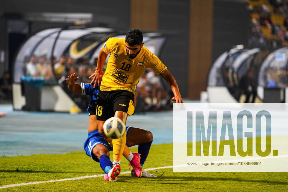 Iraq s Al-Quwa Al-Jawiya (Air Force)?? Iran s Sepahan - AFC Champions League in Erbil, Iraq - 18 Sep 2023 Jawiya s player 77 Ahmed Al-sarori (L) and Sepahan s player 18 Milad Zakipour (R) compete for the ball during the first round of the AFC Champions League group stage matches between Iraq s Al-Quwa Al-Jawiya (Air Force) and Iran s Sepahan in Franso Hariri stadium in Erbil city, the capital of Iraq s northern autonomous Kurdistan region. Final score 2-2 Erbil Iraq