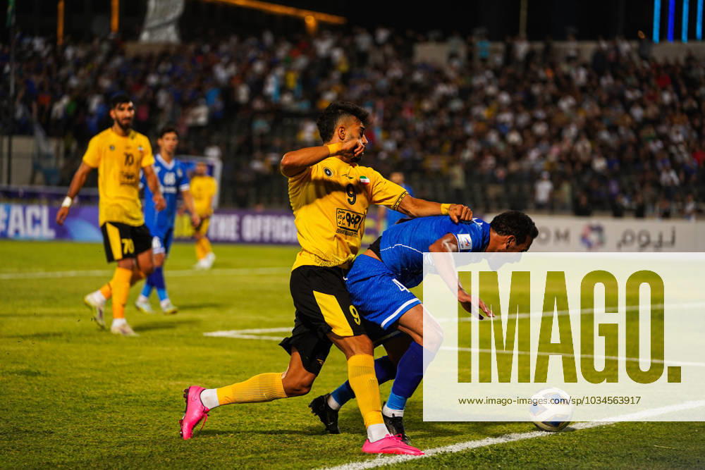 Iraq s Al-Quwa Al-Jawiya (Air Force)?? Iran s Sepahan - AFC Champions League in Erbil, Iraq - 18 Sep 2023 Jawiya s player 48 Ruslan Hanoon (R) and Sepahan s player 9 Ramin Rezaeiansemeskandi (L) compete for the ball during the first round of the AFC Champions League group stage matches between Iraq s Al-Quwa Al-Jawiya (Air Force) and Iran s Sepahan in Franso Hariri stadium in Erbil city, the capital of Iraq s northern autonomous Kurdistan region. Final score 2-2 Erbil Iraq