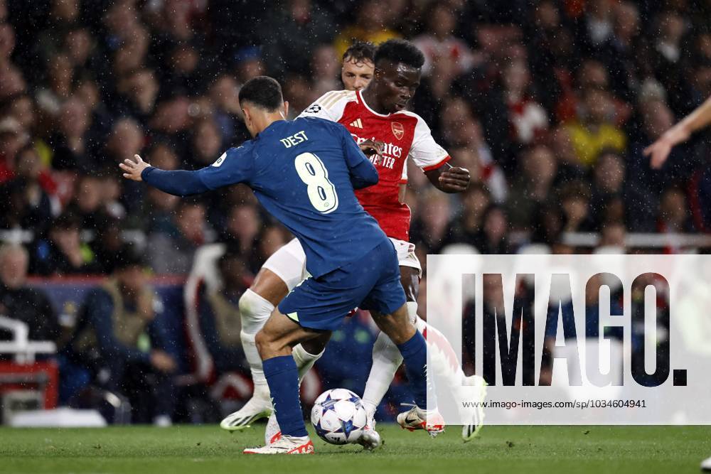 LONDON - (l-r) Sergino Dest of PSV Eindhoven, Bukayo Saka of Arsenal FC during the UEFA Champions League match between Arsenal FC and PSV Eindhoven at the Emirates Stadium on September 20, 2023 in London, United Kingdom. ANP MAURICE VAN STEEN Group B - UEFA Champions League 2023 2024 ANPxSportx IVx 478805659 originalFilename: 478805659