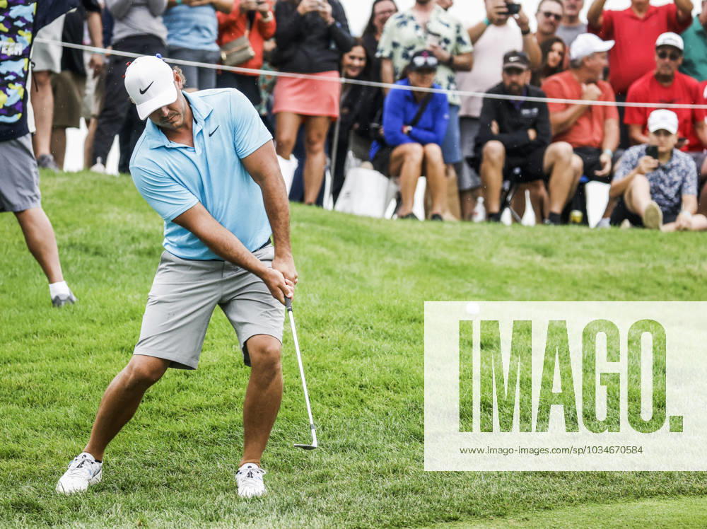 Brooks Koepka of the US chips onto the fifteenth green during the first round of the 2023 LIV Golf League tournament at Rich Harvest Farms in Sugar Grove, Illinois, on Friday September 22, 2023. Tournament play runs from September 22nd through the 24th. SGI20230922845 TANNENxMAURY