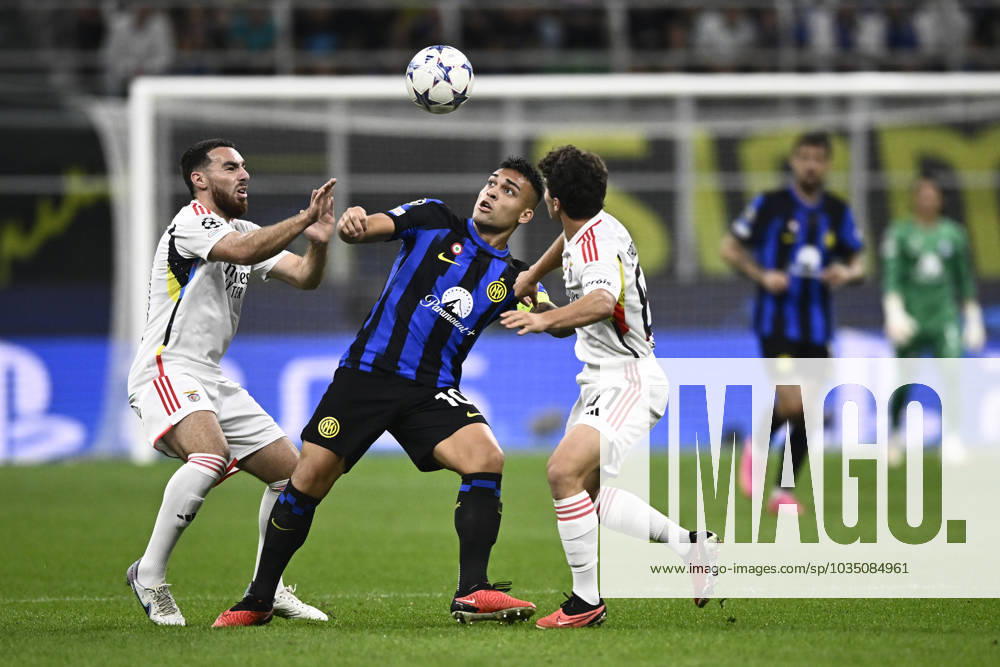 FC Internazionale v SL Benfica - UEFA Champions League Lautaro Martinez (C) of FC Internazionale comeptes for the ball with Orkun Kokcu (L) and Joao Neves of SL Benfica during the UEFA Champions League football match between FC Internazionale and SL Benfica. Milan Italy