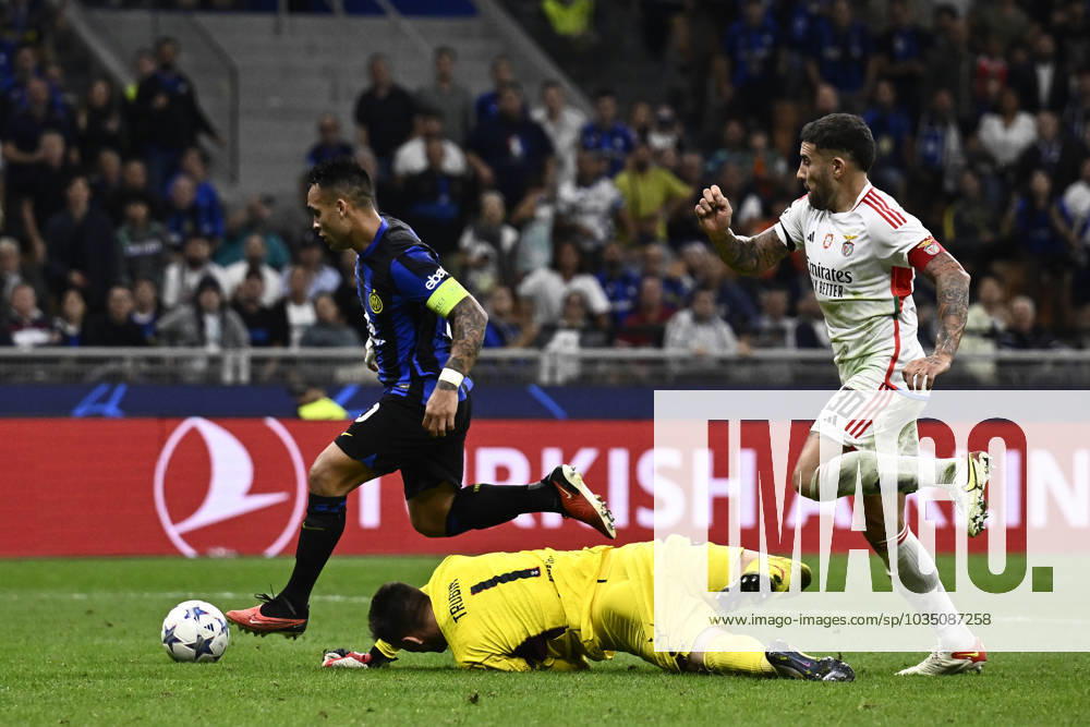 FC Internazionale v SL Benfica - UEFA Champions League Lautaro Martinez of FC Internazionale competes for the ball with Anatoliy Trubin of SL Benfica and Joao Mario of SL Benfica during the UEFA Champions League football match between FC Internazionale and SL Benfica. Milan Italy