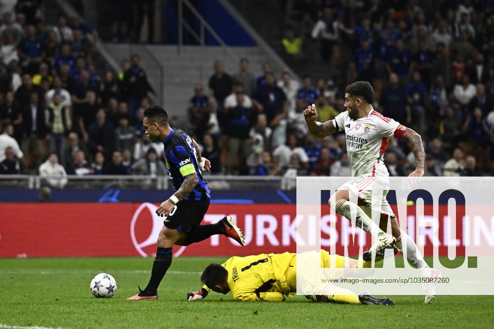 FC Internazionale v SL Benfica - UEFA Champions League Lautaro Martinez of FC Internazionale competes for the ball with Anatoliy Trubin of SL Benfica and Joao Mario of SL Benfica during the UEFA Champions League football match between FC Internazionale and SL Benfica. Milan Italy