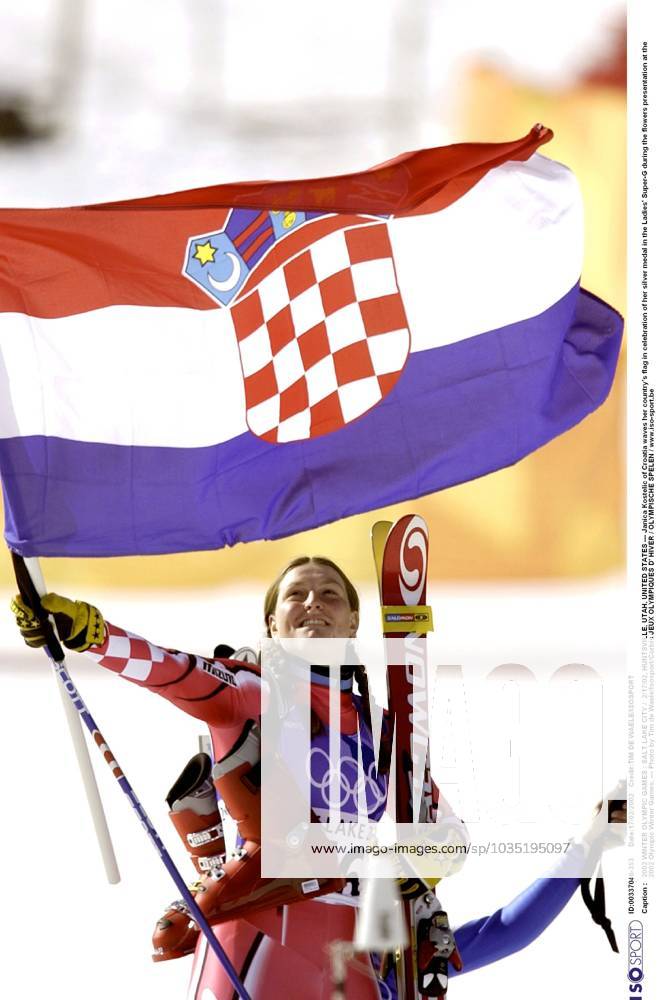 2002 WINTER Olympic Games, Olympische Spiele, Olympia, OS : 2002 WINTER OLYMPIC GAMES : SALT LAKE CITY 2 17 02, HUNTSVILLE, UTAH, UNITED STATES --- Janica Kostelic of Croatia waves her country s flag in celebration of her silver medal in the Ladies Super-G during the flowers presentation at the 2002 Olympic Winter games, Winterspiele,Spiele, Summer games --- Photo by Tim de Waele Isosport Corbis JEUX OLYMPIQUES D HIVER OLYMPISCHE SPELEN www.iso be Ogden United States ETATS UNIS VERENIGDE STATEN