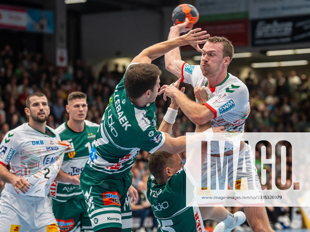 Felix Claar SC Magdeburg, 07 in duel with Tobias Ellebaek Frisch Auf Goeppingen, 17 , Frisch Auf Goeppingen vs SC Magdeburg, 1 Bundesliga, Handball, Men, 07 10 2023 Frisch Auf Goeppingen vs SC Magdeburg, 1 Bundesliga, Handball, Men, 07 10 2023 Goeppingen