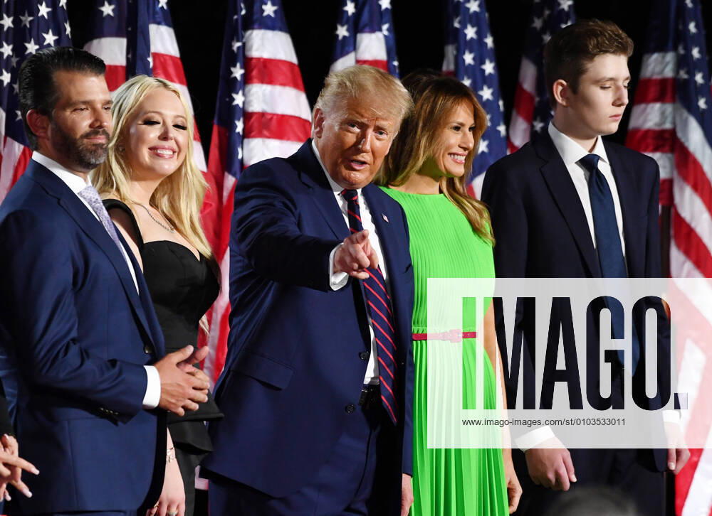 President Donald Trump (C) stands with family members, son Donald Trump Jr, daughter Tiffany Trump, First Lady Melania Trump and son Barron Trump (L - R) after speaking on the fourth and final night of the Republican National Convention, on the South Lawn of the White House in Washington D.C., Thursday, August 27, 2020. WDC20200827154 KEVINxDIETSCH