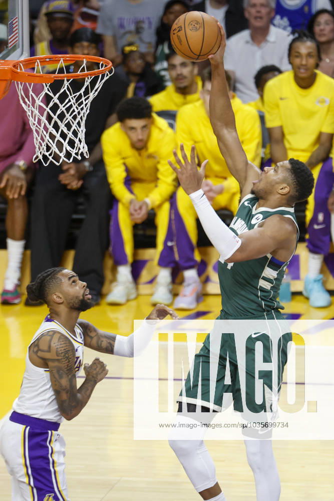 Milwaukee Bucks Giannis Antetokounmpo (34) goes to basket against Los Angeles Lakers D Angelo Russell (1) during an NBA, Basketball Herren, USA basketball pre-season game at Crypto.com Arena, Sunday, October 15, 2023, in Los Angeles. Los Angeles USA - ZUMAc68_ 20231015_zaf_c68_018