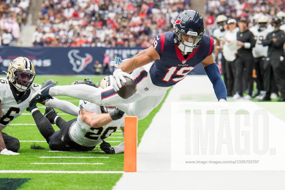 Houston Texans wide receiver Xavier Hutchinson (19) attempts to reach the endzone pylon while being forced out-of-bounds by New Orleans Saints linebacker Pete Werner (20) and safety Marcus Maye (6) during a game between the New Orleans Saints and the Houston Texans in Houston, TX. .. CSM USA - ZUMAc04_ 20231015_zma_c04_363
