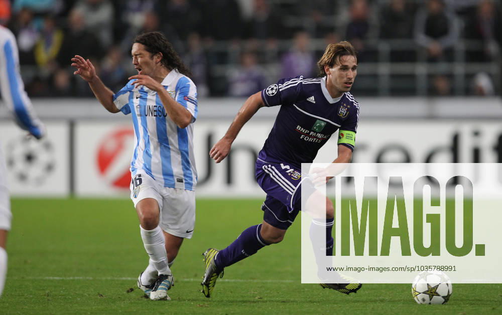 UEFA CL : RSC ANDERLECHT - MALAGA CF 20121003 - Brussels, Belgium UEFA CL : RSC ANDERLECHT - MALAGA CF Manuel ITURRA - Lucas BIGLIA UEFA CHAMPIONS LEAGUE 2012 - 2013 GROUP STAGE CL GROUP C MATCHDAY 2 SOCCER FOOTBALL VOETBAL RSCA PICTURE BY VINCENT VAN DOORNICK ISOSPORT BRUXELLES BRUSSEL BRUSSELS BELGIQUE BELGIE BELGIUM