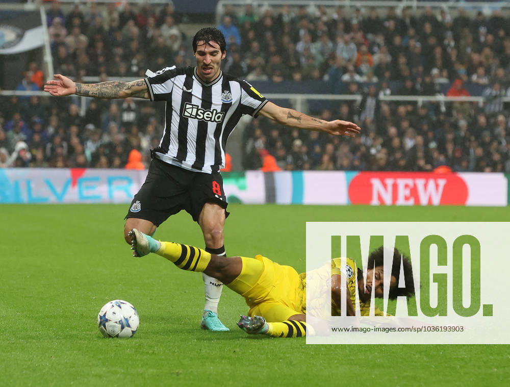 Newcastle Upon Tyne, England, 25th October 2023. Sandro Tonali of Newcastle United in action with Karim Adeyemi of Borussia Dortmund during the UEFA Champions League match at St. James Park, Newcastle Upon Tyne. Picture credit should read: Nigel Roddis Sportimage . SPI-2675-0023