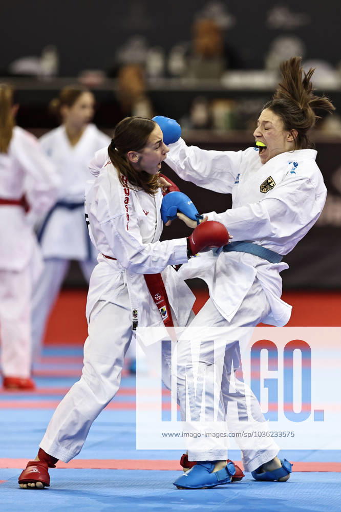 Madeleine Schröter, GER blue , and an Ukrainian player unknown due to unprofessional organization during female s team kumite at 2023 karate world championships in Budapest 26 10 2023
