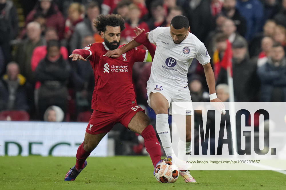 UEFA Europa League Liverpool v Toulouse Mohamed Salah 11 of Liverpool competes for the ball with Yanis Begraoui 14 of Toulouse during the UEFA Europa League match Liverpool vs Toulouse at Anfield, Liverpool, United Kingdom, 26th October 2023 (Photo by Steve Flynn News Images) Liverpool Anfield Merseyside United Kingdom