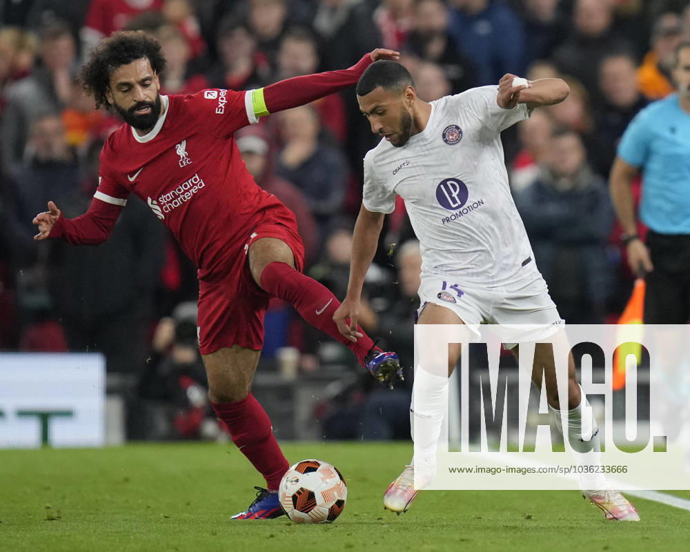 UEFA Europa League Liverpool v Toulouse Mohamed Salah 11 of Liverpool competes for the ball with Yanis Begraoui 14 of Toulouse during the UEFA Europa League match Liverpool vs Toulouse at Anfield, Liverpool, United Kingdom, 26th October 2023 (Photo by Steve Flynn News Images) Liverpool Anfield Merseyside United Kingdom