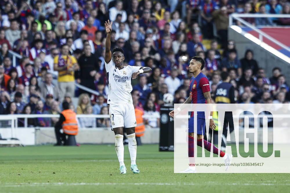 FC Barcelona, Barca Vs Real Madrid - La Liga 07 Vinicius Jr. of Real Madrid celebrates the victory in front of 11 Raphinha of FC Barcelona during the La Liga el clasico match between FC Barcelona v Real Madrid at Estadi Olimpic Lluis Companys in Barcelona, Spain, on October 28th, 2023. Barcelona Catalonia Spain