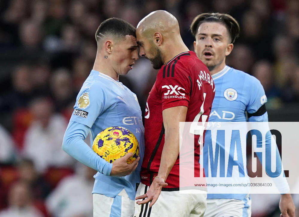 KW43 Manchester, England, 29th October 2023. Phil Foden of Manchester City and Sofyan Amrabat of Manchester United, ManU go head to head leading to a yellow card for Amrabat during the Premier League match at Old Trafford, Manchester. Picture credit should read: Andrew Yates Sportimage . SPI-2690-0036