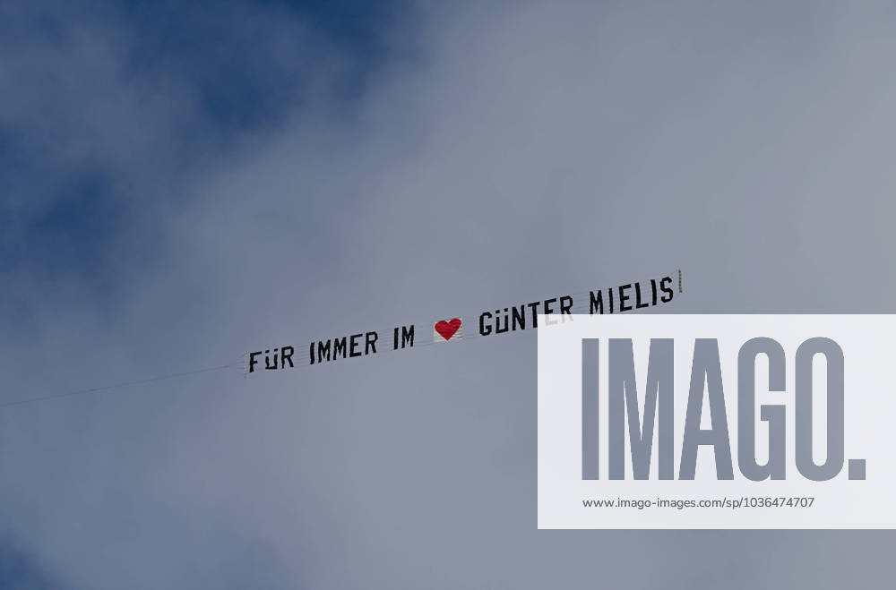 Football, men, season 2023 2024, 1 Bundesliga, 1 FC Union Berlin, funeral service for honorary president Günter Mielis at the cemetery of the parish St Laurentius in Berlin Köpenick Rudower Straße 12 , Mielis died on 29 September 2023 at the age of 98 years, plane above the cemetery shortly before the start of the funeral service with banner Forever in the heart Günter Mielis, 01 11 2023,