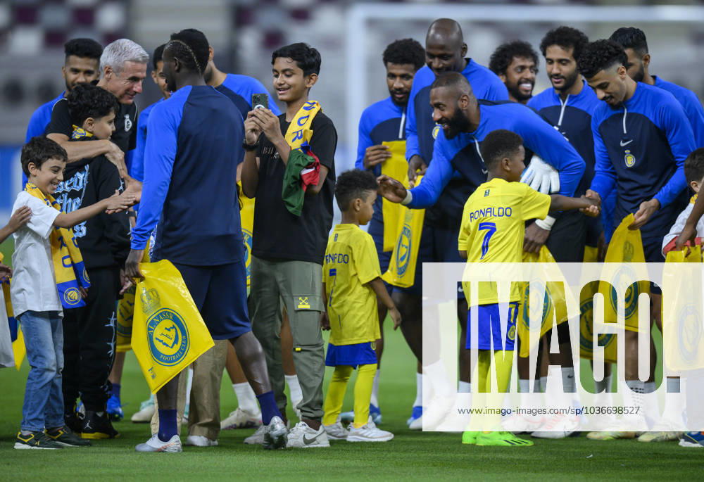 Al Duhail SC (QAT)v Al Nassr (KSA)- AFC Champions League In Doha Saudi Arabias Al Nasser players with young fans before the training session at Khalifa International Stadium in Doha on 06 November 2023 on the eve of their AFC Champions League Group E match against Qatar s Al Duhail SC DOHA Qatar
