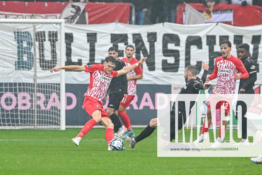 Rico Preissinger SC Preussen Muenster, 21 graescht grabs the ball from Pascal Fallmann SC Freiburg II, 17 GER, SC Freiburg II SC Preussen Muenster, Football, 3 Liga, Matchday 15, , 12 11 2023 DFB REGULATIONS PROHIBIT ANY USE OF PHOTOGRAPHS AS IMAGE SEQUENCES AND OR QUASI VIDEO GER, SC Freiburg II SC Preussen Muenster, Football, 3 Liga, Matchday 15, , 12 11 2023 Freiburg