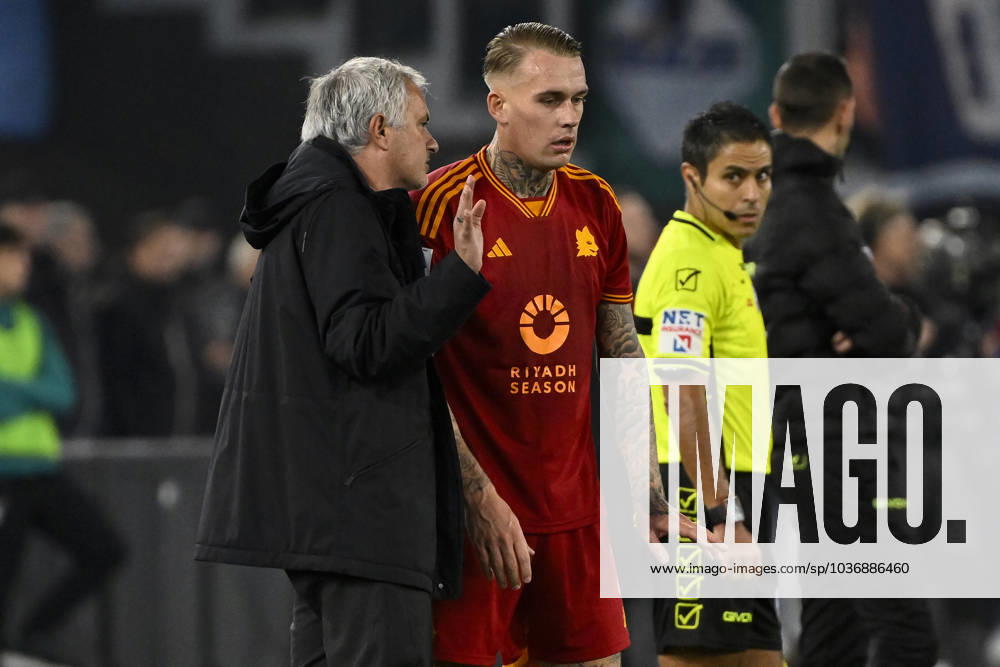 Jose Mourinho coach of AS Roma talks with Rick Karsdorp during the Serie A football match between SS Lazio and AS Roma at Olimpico stadium in Rome (Italy), November 12, 2023. andreaxstaccioli