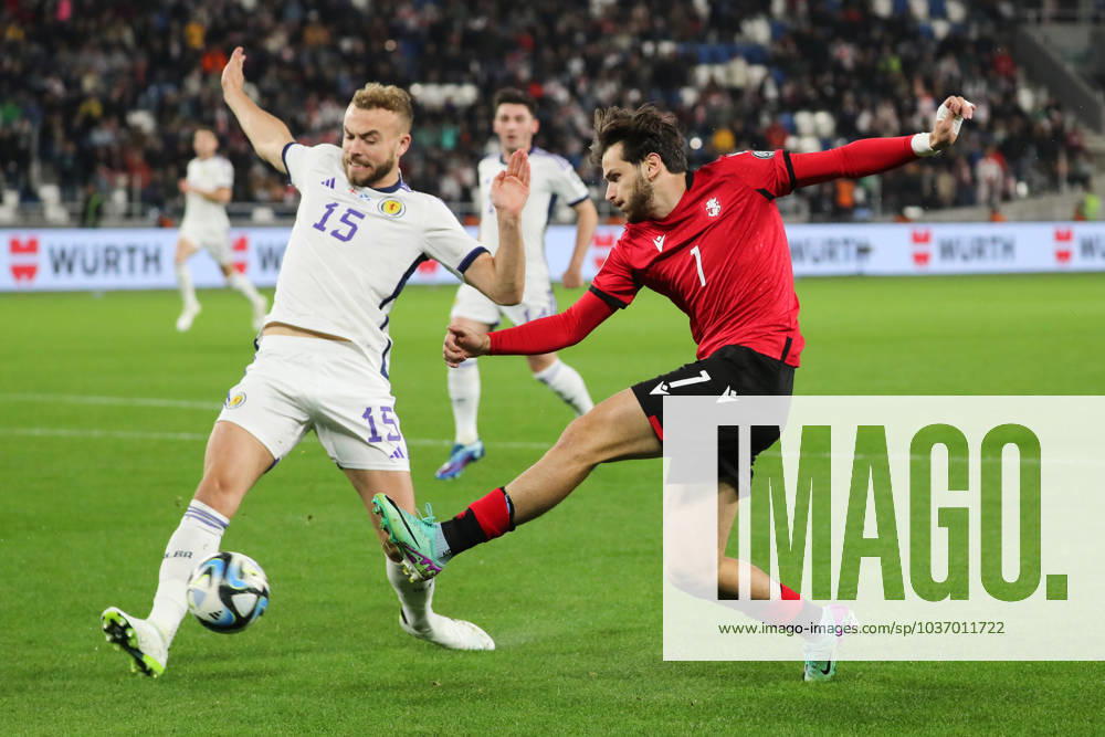 Khvicha Kvaratskhelia of Georgia against Ryan Porteous of Scotland during the UEFA European Championship, EM, Europameisterschaft Qualifying match between Georgia and Scotland at the The Boris Paitchadze Dinamo Arena on November 16, 2023 in Tbilisi, Georgia. Tbilisi Boris Paitchadze Dinamo Arena, Akaki Tsereteli Avenue, Didube District, Tbilisi, 0112, Georgia Georgia