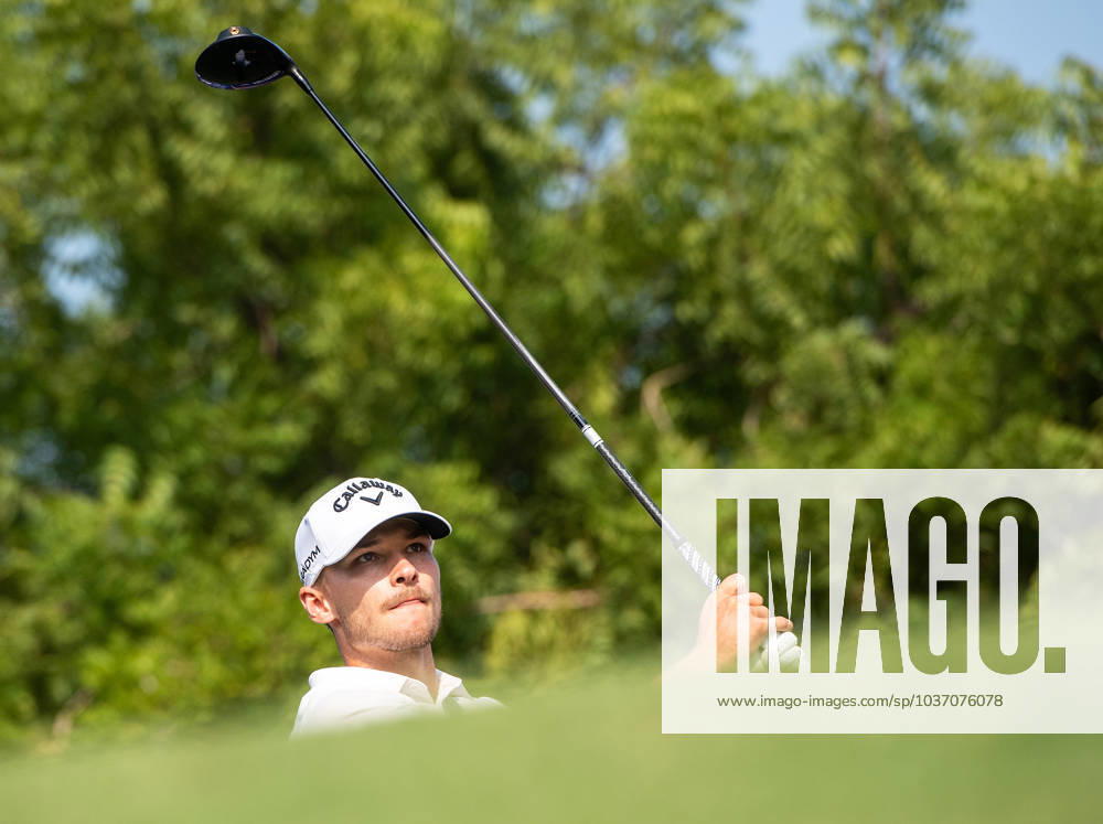 NICOLAI HoJGAARD of Denmark watches the ball after a tee-off at the 14th hole during DP World Tour Championship in Dubai, United Arab Emirates, Nov 19, 2023. Dubai United Arab Emirates
