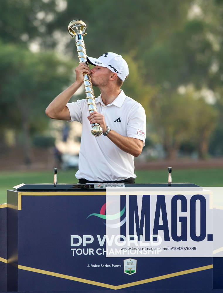 NICOLAI HoJGAARD of Denmark kisses the trophy after winning DP World Tour Championship in Dubai, United Arab Emirates, Nov 19, 2023. Dubai United Arab Emirates