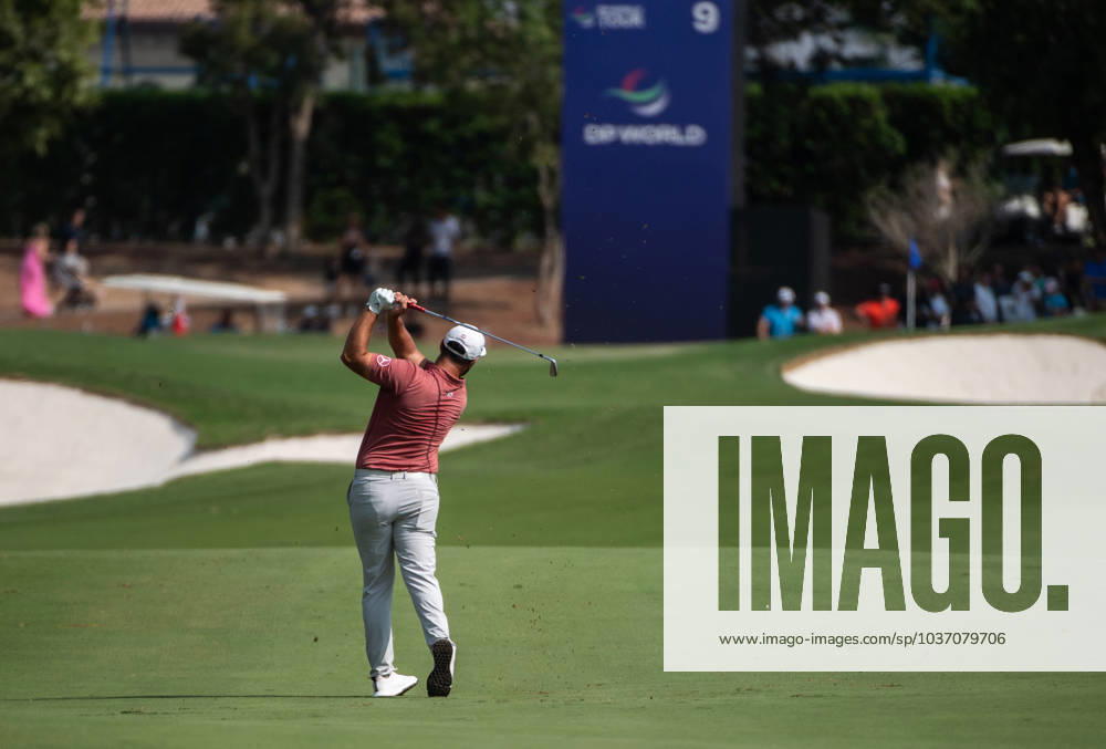 JON RAHM of Spain strikes the ball on the ninth fairway during DP World Tour Championship in Dubai, United Arab Emirates, Nov 19, 2023. Dubai United Arab Emirates