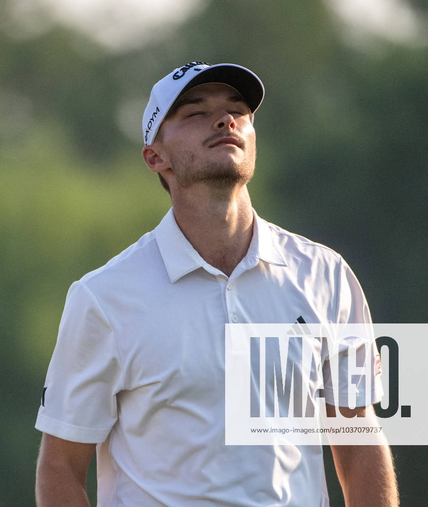 NICOLAI HoJGAARD of Denmark reacts after missing a putt on the 18th green during DP World Tour Championship in Dubai, United Arab Emirates, Nov 19, 2023. Dubai United Arab Emirates