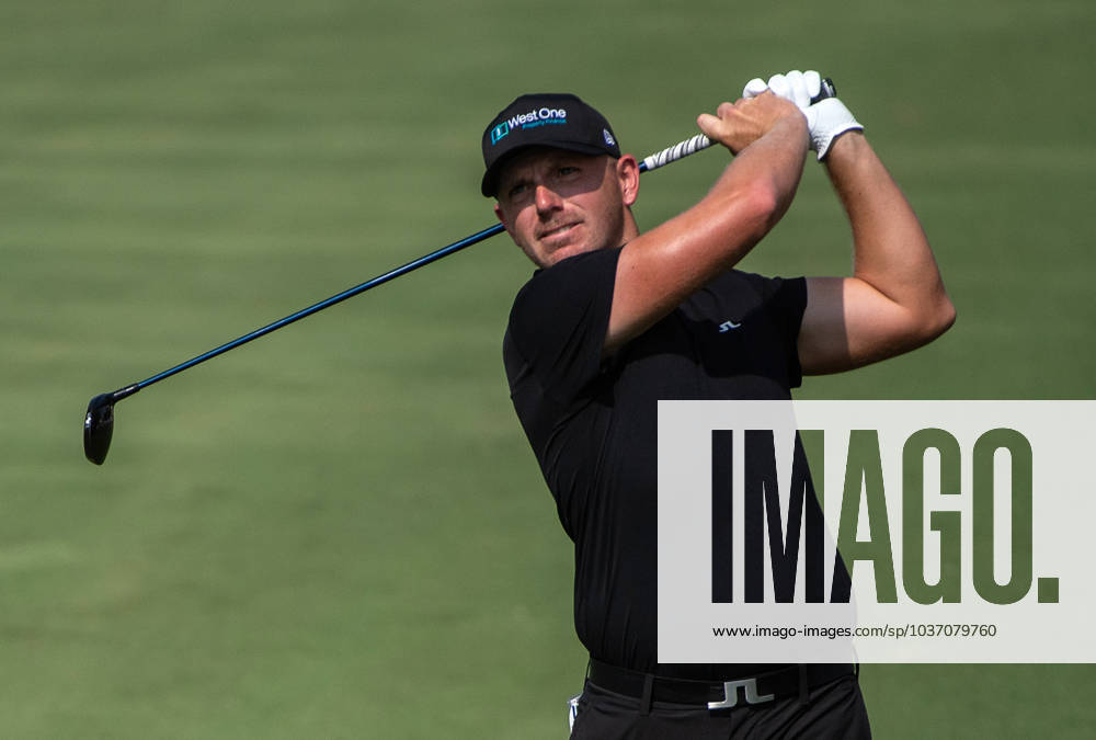 MATT WALLACE of England strikes the ball on the second fairway during DP World Tour Championship in Dubai, United Arab Emirates, Nov 19, 2023. Dubai United Arab Emirates
