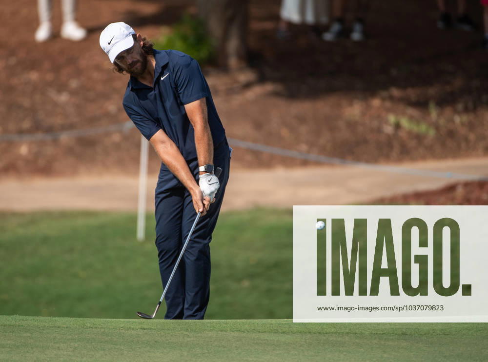 TOMMY FLEETWOOD of England strikes the ball to the fifth green during DP World Tour Championship in Dubai, United Arab Emirates, Nov 19, 2023. Dubai United Arab Emirates