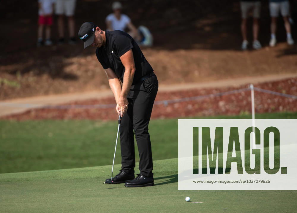 MATT WALLACE of England putts on the fifth green during DP World Tour Championship in Dubai, United Arab Emirates, Nov 19, 2023. Dubai United Arab Emirates