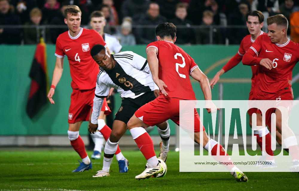 Football, Men, Qualification for the U21 European Championship 2025, Stadion an der Hafenstraße, Essen Germany Poland Lukasz Bejger POL , Youssoufa Moukoko GER , Ariel Mosor POL , Jakub Kaminski POL , Mateusz Legowski POL Action UEFA REGULATIONS PROHIBIT ANY USE OF PHOTOGRAPHS AS IMAGE SEQUENCES AND OR QUASI VIDEO