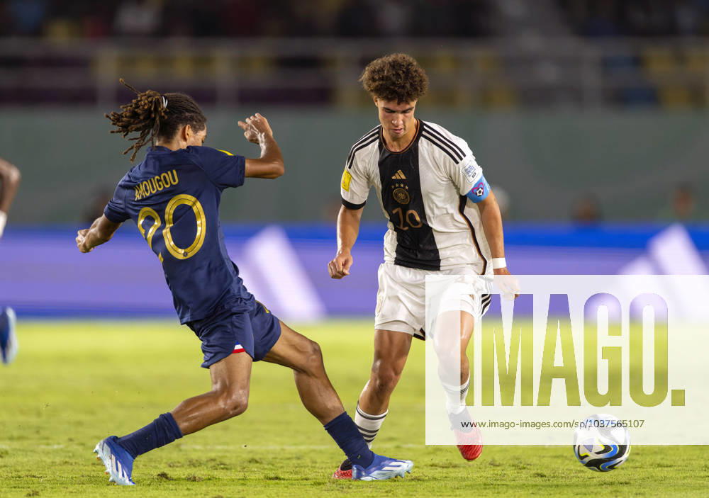Football U 17 World Cup 2023, Final Germany France, at Manahan Stadium Surakarta from left Mathis Amougou France against Noah Darvich Germany