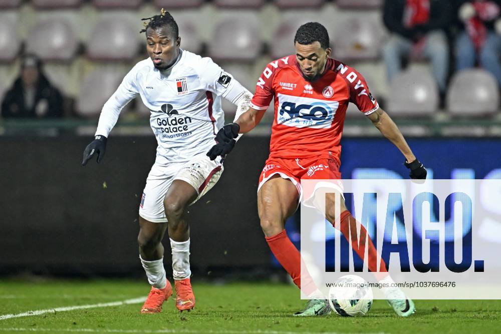 KV Kortrijk v RWDM - Belgian Croky Cup KORTRIJK, BELGIUM - DECEMBER 05 : Henen David forward of KV Kortrijk and Kone Youssouf defender of RWDM during the Belgian Croky Cup round of sixteen match between KV Kortrijk and RWDM in the Guldensporen stadium on December 5, 2023 in Kortrijk, Belgium, 05 12 2023 Kortrijk Belgium
