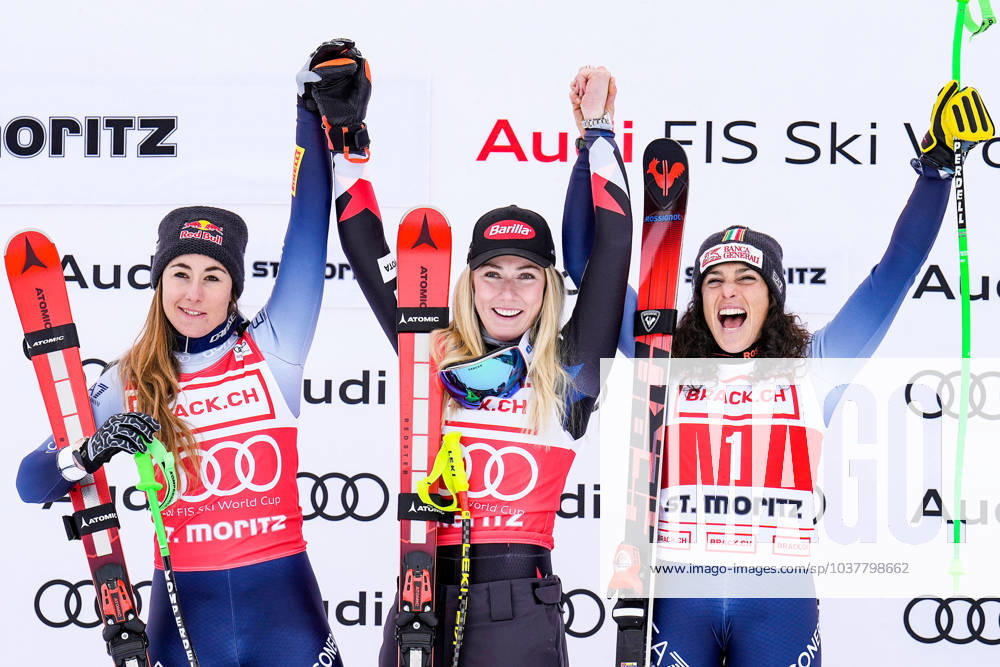 KW49 ALPINE SKIING - FIS WC St. Moritz SANKT MORITZ,SWITZERLAND,09.DEC.23 - ALPINE SKIING - FIS World Cup, downhill, ladies, award ceremony. Image shows the rejoicing of Sofia Goggia (ITA), Mikaela Shiffrin (USA) and Federica Brignone (ITA). +03771725 1+