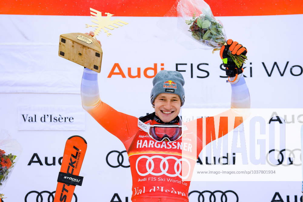KW49 ALPINE SKIING - FIS WC Val D Isere VAL D ISERE,FRANCE,09.DEC.23 - ALPINE SKIING - FIS World Cup, giant slalom, men, award ceremony. Image shows the rejoicing of Marco Odermatt (SUI) . Keywords: trophy. GEPAxpictures Buehner