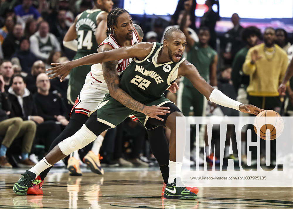 (231212) -- MILWAUKEE, Dec. 12, 2023 -- Khris Middleton of Milwaukee Bucks (R) vies with DeMar DeRozan of Chicago Bulls during the 2023-2024 NBA, Basketball Herren, USA regular season match between Milwaukee Bucks and Chicago Bulls at Fiserv Forum in Milwaukee, the United States, Dec. 11, 2023. (Photo by Xinhua) (SP)U.S.-MILWAUKEE-BASKETBALL-NBA-BUCKS VS BULLS JoelxLerner