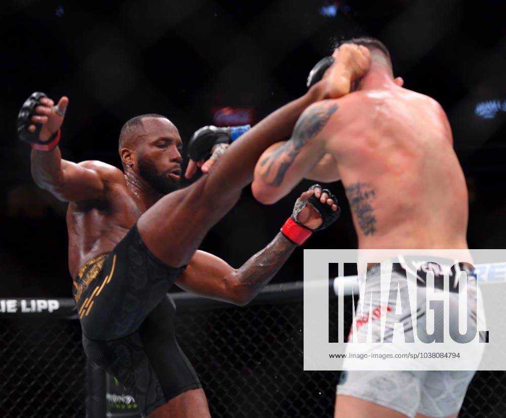 LEON EDWARDS (21-3-0) of Erdington, birmingham, England (L) defeats COLBY COVINGTON (17-3-0) of Miami, Florida USA (R) by a unanimous decision (49-46, 49-46, 49-46) during UFC 296 at T-Mobile Arena, Las Vegas Las Vegas USA - ZUMAo117 20231216_zsp_o117_051