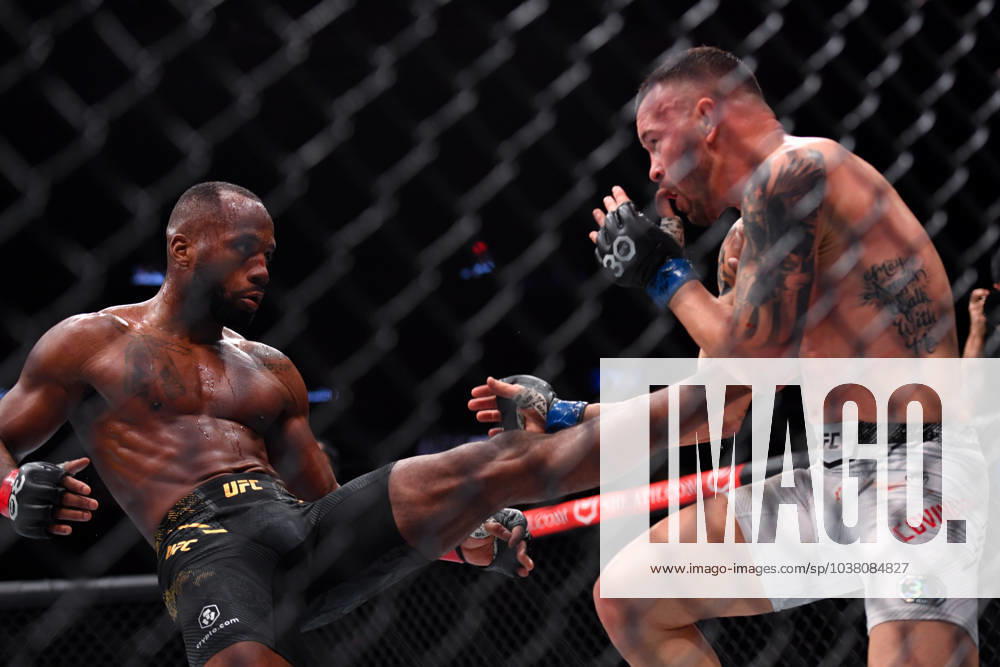 LEON EDWARDS (21-3-0) of Erdington, birmingham, England (L) defeats COLBY COVINGTON (17-3-0) of Miami, Florida USA (R) by a unanimous decision (49-46, 49-46, 49-46) during UFC 296 at T-Mobile Arena, Las Vegas Las Vegas USA - ZUMAo117 20231216_zsp_o117_054