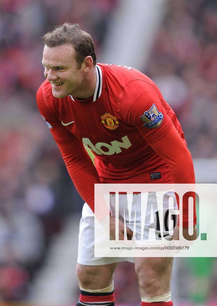 Wayne Rooney of Manchester United smiles after missing a volley.Barclays Premier League match between Manchester Utd v Aston Villa at Old Trafford Stadium, Manchester on the 15th April 2012.. .