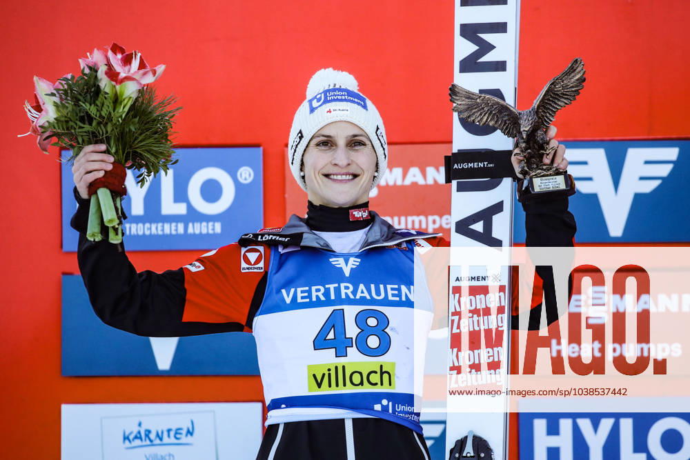 KW01 Ski jumping, Skispringen, Ski, nordisch - FIS WC Villach VILLACH,AUSTRIA,03.JAN.24 - NORDIC SKIING, SKI JUMPING - FIS World Cup, normal hill, ladies, award ceremony. Image shows the rejoicing of Eva Pinkelnig (AUT). Keywords: trophy. GEPAxpictures Klansek
