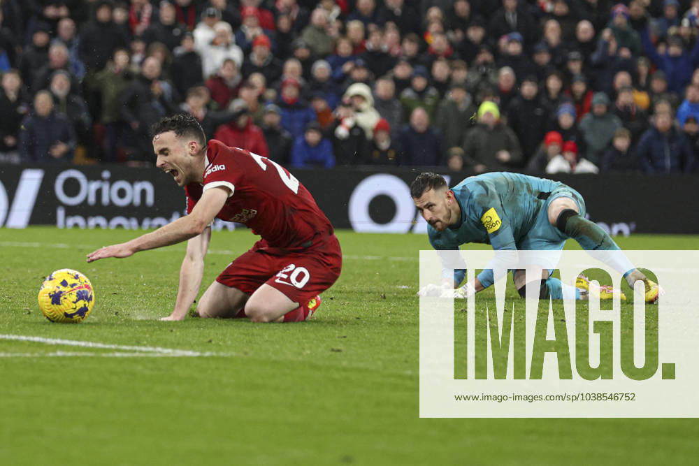 Football - 2023 2024 Premier League - Liverpool vs Newcastle United - Anfield - Monday 1st January 2024. Diogo Jota of Liverpool is brought down by Martin Dubravka of Newcastle United for a penalty