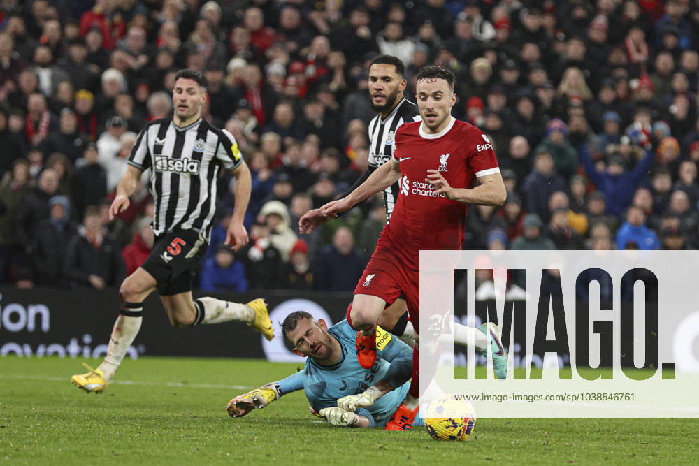 Football - 2023 2024 Premier League - Liverpool vs Newcastle United - Anfield - Monday 1st January 2024. Diogo Jota of Liverpool is brought down by Martin Dubravka of Newcastle United for a penalty