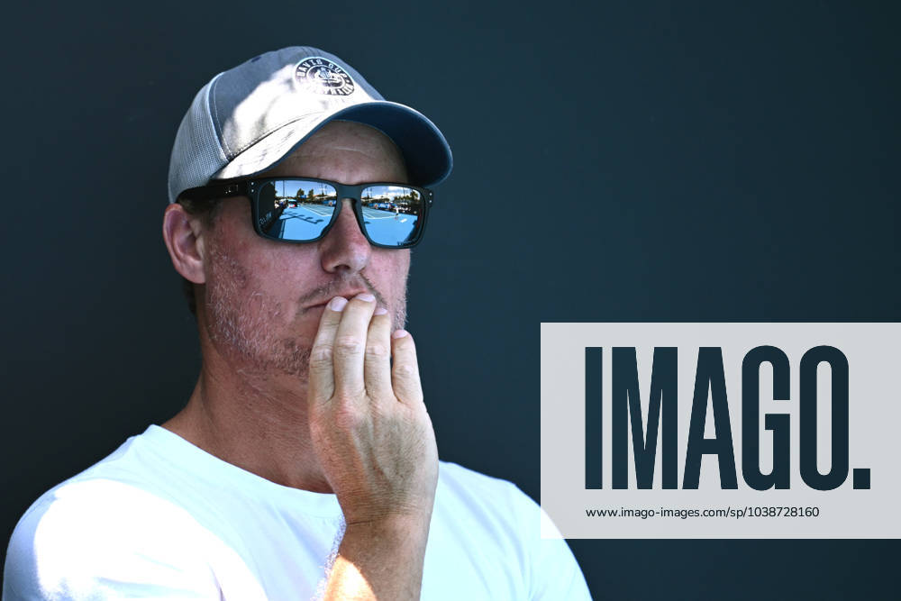 TENNIS AO PRACTICE SESSIONS, Lleyton Hewitt watches Alex De Minaur of Australia during a practise session ahead of the Australian Open 2024, at Melbourne Park in Melbourne, Tuesday, January 9, 2024. ( NO ARCHIVING, , NO USE IN BOOKS WITHOUT CONSENT MELBOURNE VICTORIA AUSTRALIA