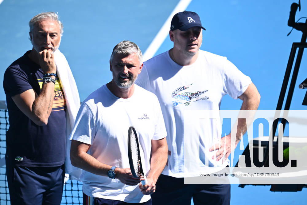 TENNIS AO PRACTICE SESSIONS, Goran Ivanisevic (centre) as Novak Djokovic of Serbia takes part in a practise session ahead of the Australian Open 2024, at Melbourne Park in Melbourne, Tuesday, January 9, 2024. ( NO ARCHIVING, , NO USE IN BOOKS WITHOUT CONSENT MELBOURNE VICTORIA AUSTRALIA