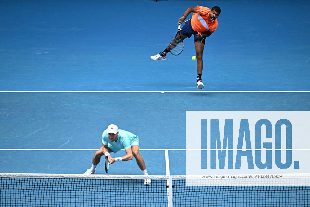 TENNIS AUSTRALIAN OPEN, Matthew Ebden (left) of Australia and Rohan Bopanna of India in action during their Men?s Doubles semifnal against Tomas Machac of Czech Republic and Zhizhen Zhang of China on Day 12 of the 2024 Australian Open at Melbourne Park in Melbourne, Thursday, January 25, 2024. ( NO ARCHIVING, , NO USE IN BOOKS WITHOUT CONSENT MELBOURNE VICTORIA AUSTRALIA