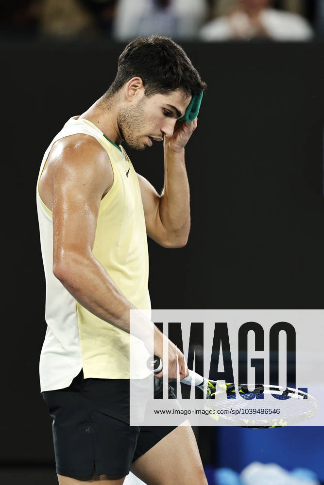 Tennis: Australian Open Carlos Alcaraz of Spain wipes his brow after losing to Alexander Zverev of Germany in the men s singles quarterfinals at the Australian Open tennis tournament in Melbourne in the small hours of Jan. 25, 2024. A14AA0002376798P