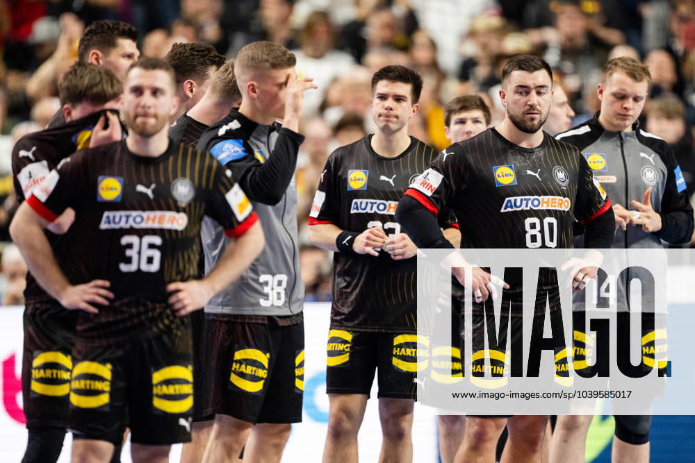 Players of Germany look dejected after the EHF European Handball Championship semifinal match between Germany and Denmark on January 26, 2024 in Cologne Photo Ludvig Thunman BILDBYRAN code LT LT0596 handball handboll handballs em 2024 semifinal semifinals germany denmark denmark ehf european handball championship germany 16 bbeng depp